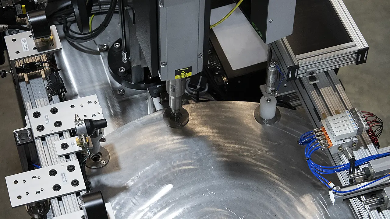 Automated check valve welding machine